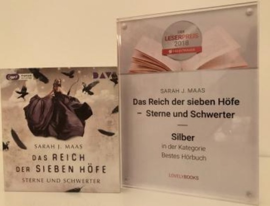 Foto von CD-Booklet "Sterne und Schwerter" und dem gewonnenen Preis in Silber